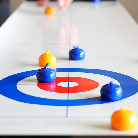 Mini-tafelcurlingspel voor thuis met glijstenen en magneetstangen